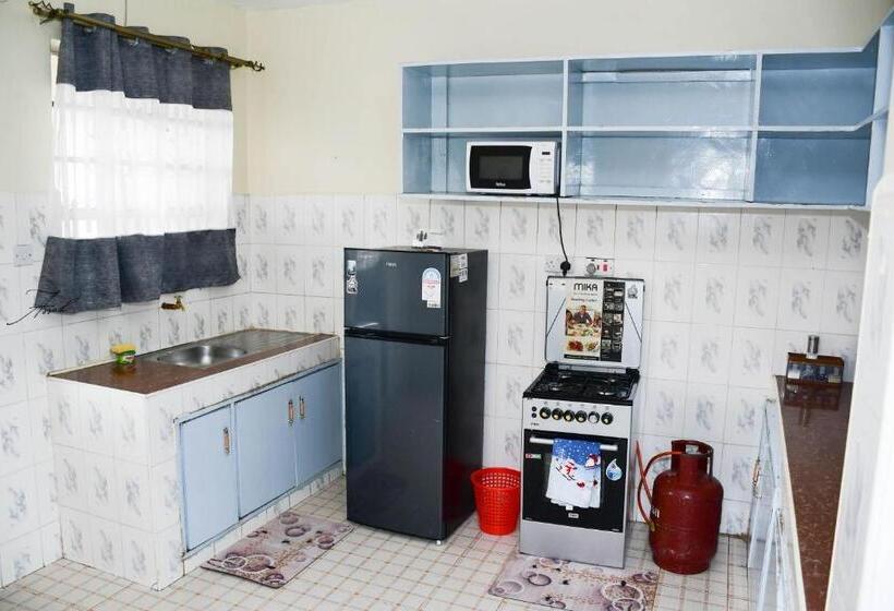 تختخواب و صبحانه Mema Homes