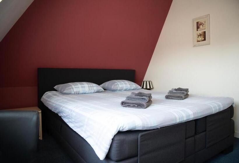 Отель De Harmonie