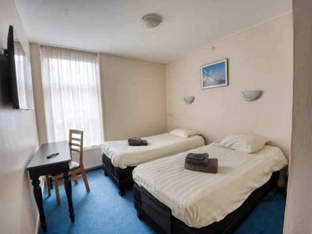 Отель De Harmonie