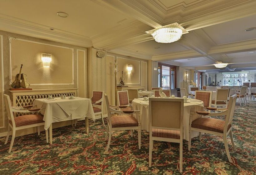 Отель Le Suisse Elegance