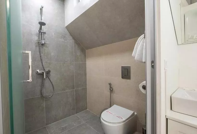 ホテル Caro Apartments & Rooms