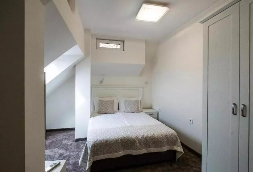 ホテル Caro Apartments & Rooms