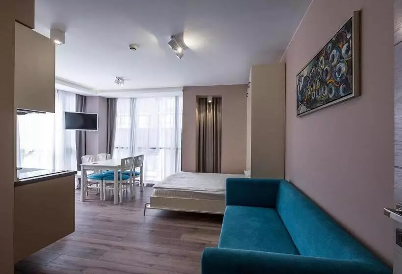 ホテル Caro Apartments & Rooms