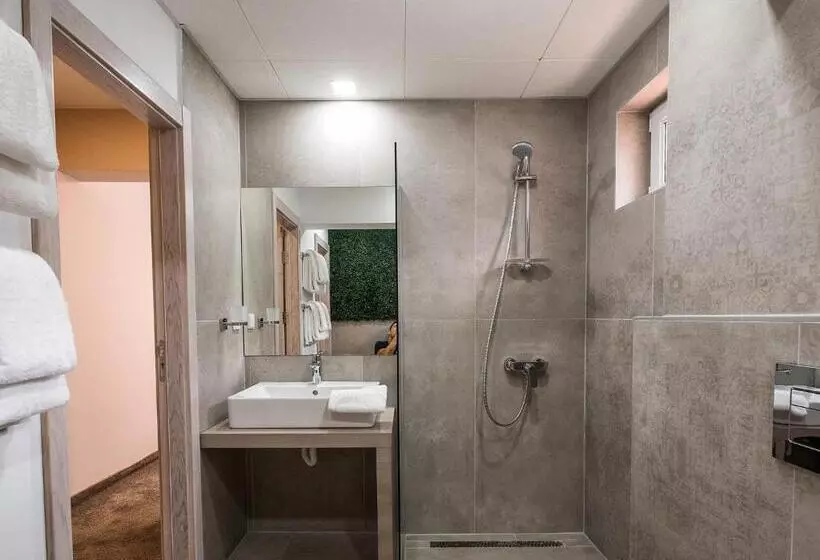 ホテル Caro Apartments & Rooms