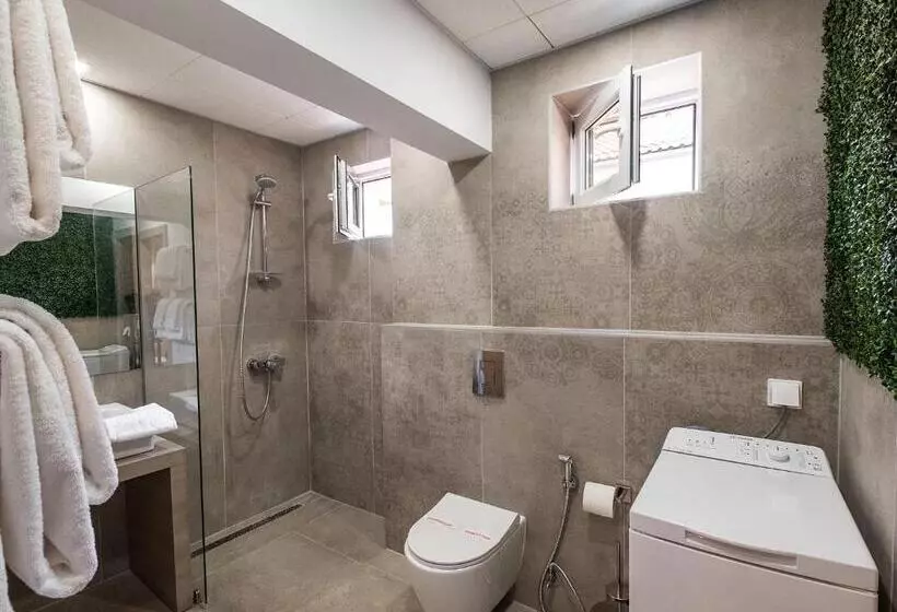 ホテル Caro Apartments & Rooms