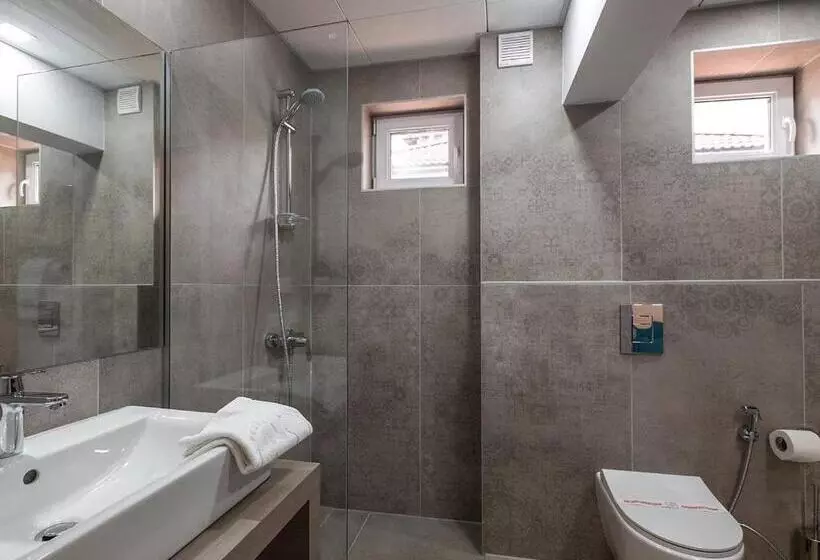 ホテル Caro Apartments & Rooms