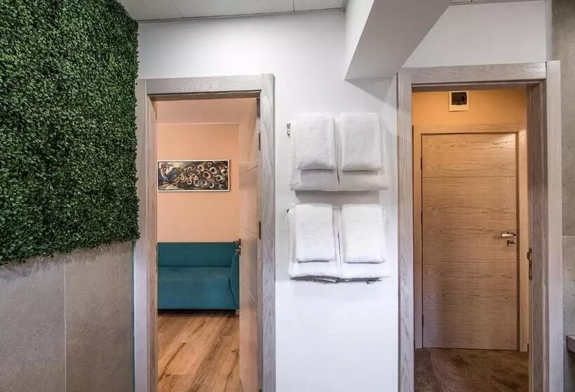 ホテル Caro Apartments & Rooms