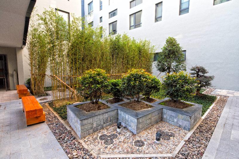 Отель Holiday Inn Express Qidong Downtown