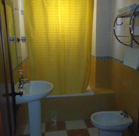 Pensión Y Apartamentos El Taxi