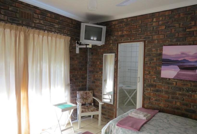 פנסיון Coral Tree Guest Rooms