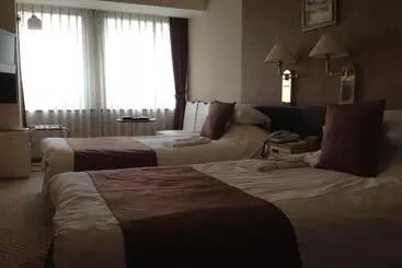 בית מלון כפרי Okayama Plaza