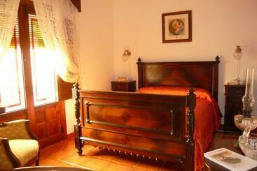 کلبه Casa De La Torre Hospederia