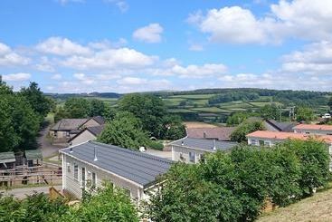 Hotell Parkers Farm Cottages And Caravans