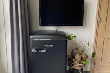 تختخواب و صبحانه T Lant Van Texsel