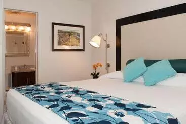 Отель Laguna Shores Studio Suites