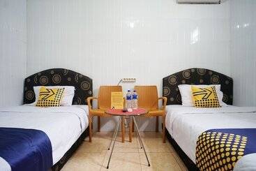 호텔 Spot On 1854 Sepinggan Asri Syariah Guesthouse