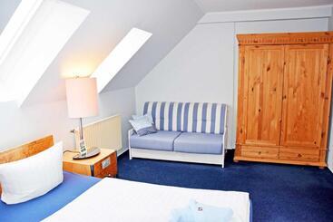 Отель Ferienwohnungen Moenchgut Und Ruegen