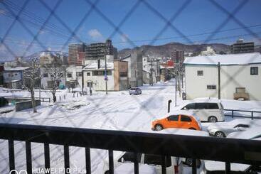 Pensió Opopo Home 竜宮店