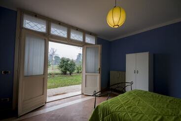 تختخواب و صبحانه R&b Un Mondo A Colori