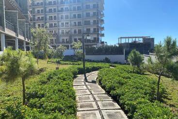 هتل آپارتمان Rosarich Homestay Bristle Ridge Residences