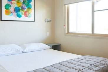 Отель Stuarts Point Holiday Park