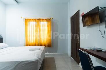 Hotel Teratai Guesthouse At Rs Adam Malik Medan Mitra Reddoorz