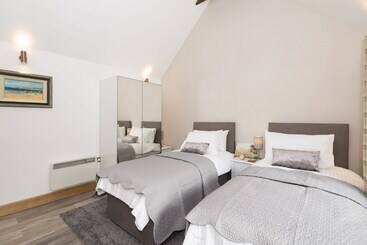 Mökkimajoitus The Milking Sheds, Dufftown