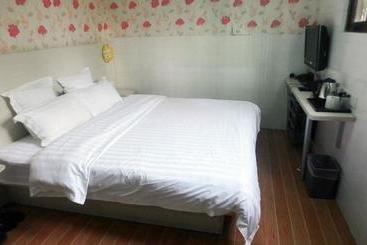 Отель Home Inns Guo Mao
