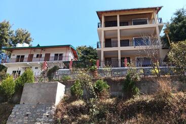 Pensão Khushi Cottage