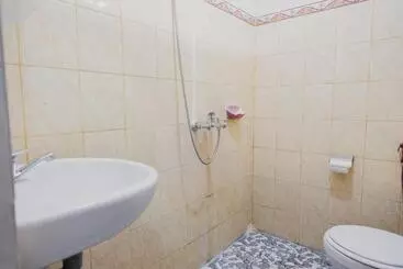 Hotelli Reddoorz Syariah Near Kebun Raya Liwa