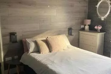 ペンション The Woodszz Guest House