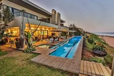 Отель Canelands Beach Club