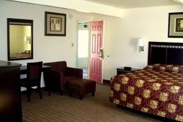 مُتل Whispering Palms Inn