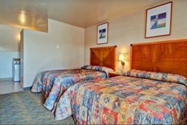 فندق Payless Inn