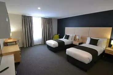 ホテル The Astor Suites