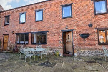 Mökkimajoitus The Dairy Barn