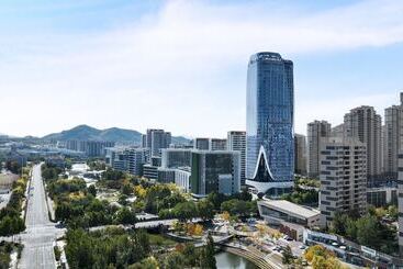 Отель Hualuxe Qingdao Licang