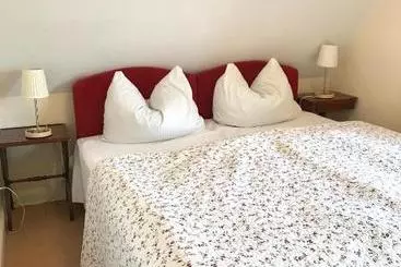 Жильё для туристов Ferienwohnung Spatzennest