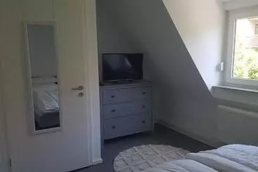 ツーリストアパートメント Ferienwohnung Höchberg