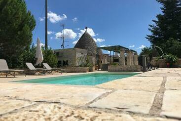تختخواب و صبحانه Trullo Grace  Trulli Anti  Charme & Relax