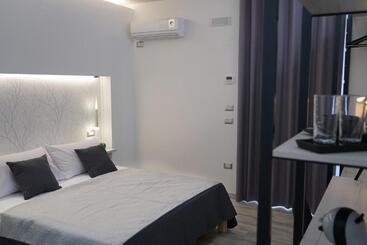 تختخواب و صبحانه Familiainn Rooms & Apartments