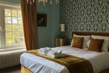 민박 Cuatre Brass Stay