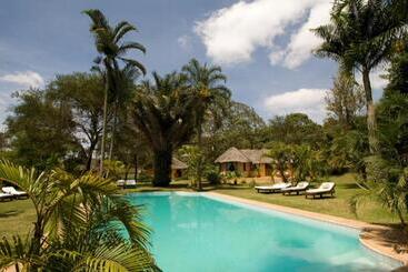 בית מלון כפרי Arusha Safari Lodge