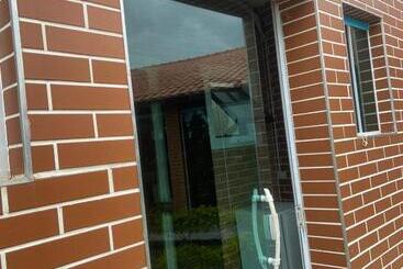 Pension (Hôtel basse catégorie) Colônia Virtual Net