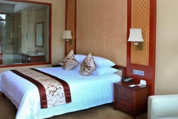 Отель New Century Resort & Spa Puer