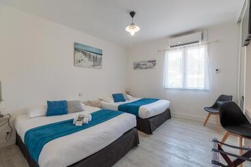 Отель Le Heron Cendre