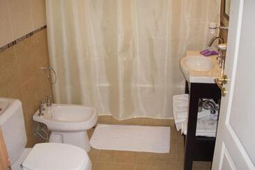 Отель Morada Suites