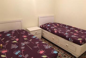 מלון כמוסות Tch Capsule Home