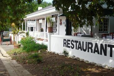 Отель The Oil Mill Guesthouse