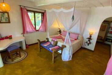 리조트 Butiama Beach Lodge